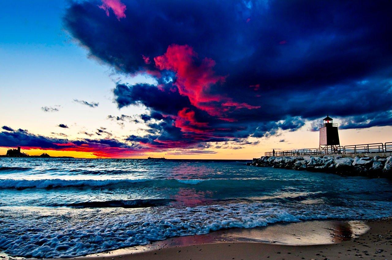 Sunset over the Lighthouse - Visit Charlevoix, Michigan